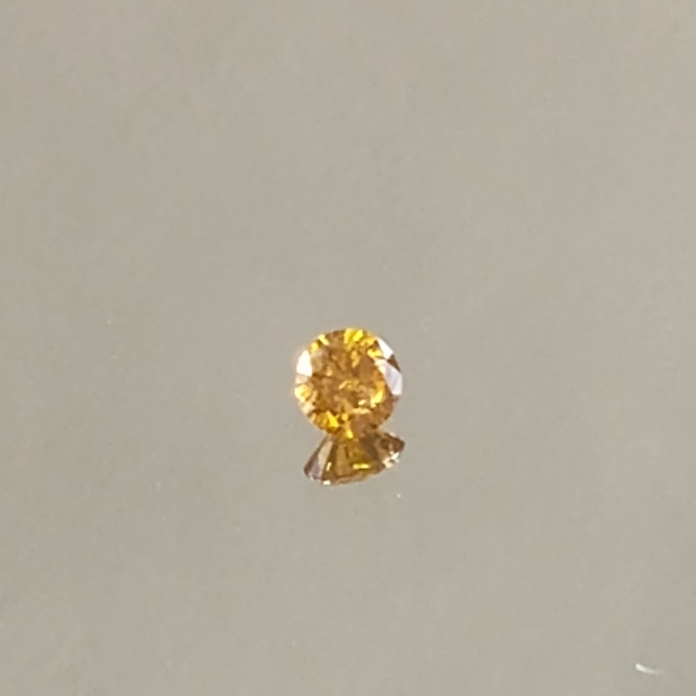 Loose gold diamond gemstone